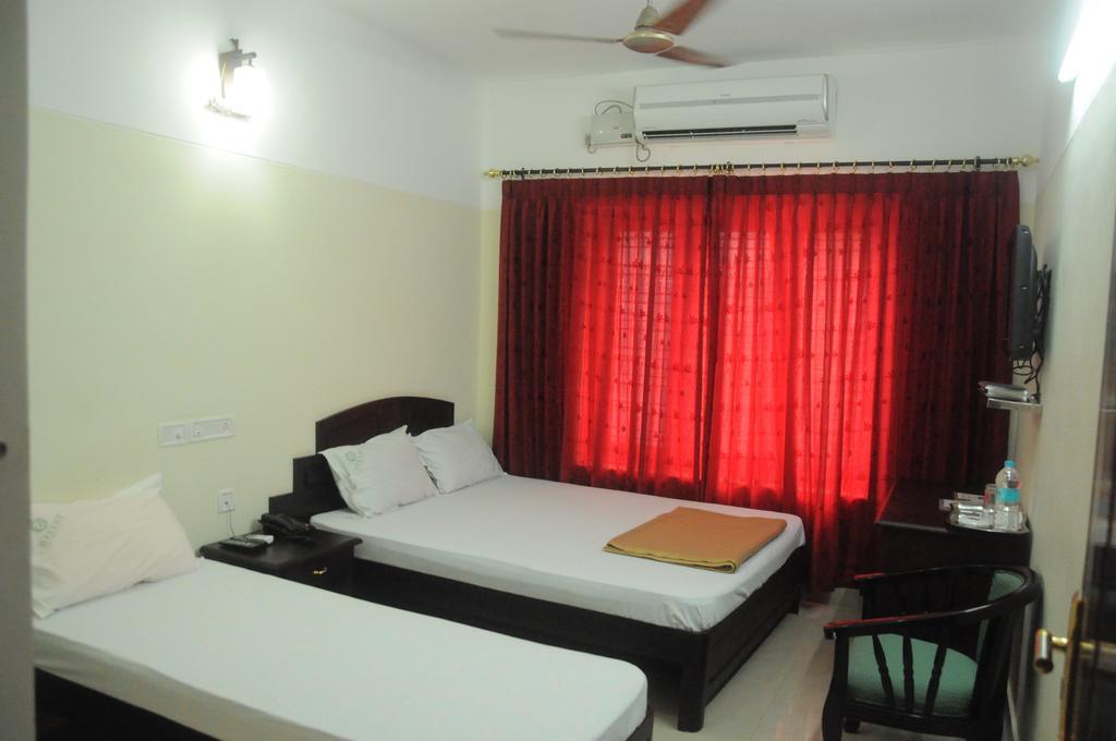 Dreamz Hotel Thiruvananthapuram Oda fotoğraf